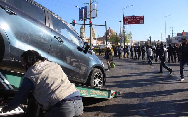 Se llevan vehículo tras protesta de conductor Uber, DiDi, Cabify. Foto: Bibiana Díaz | El Sol de Puebla